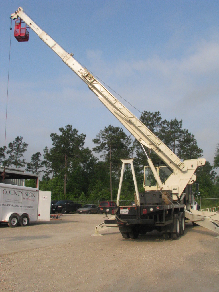 County Sign and awning SETX crane rental, SETX Crane Rental Company, Auger service Beaumont TX, crane rental Port Arthur, crane rental Nederland Tx, crane rental Bridge City TX